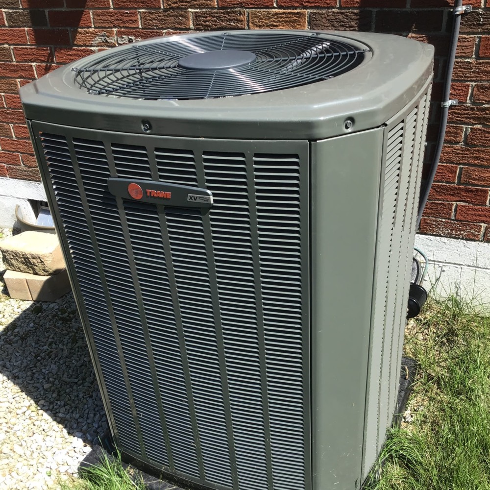 New central air conditioner condenser installed at a Toronto home